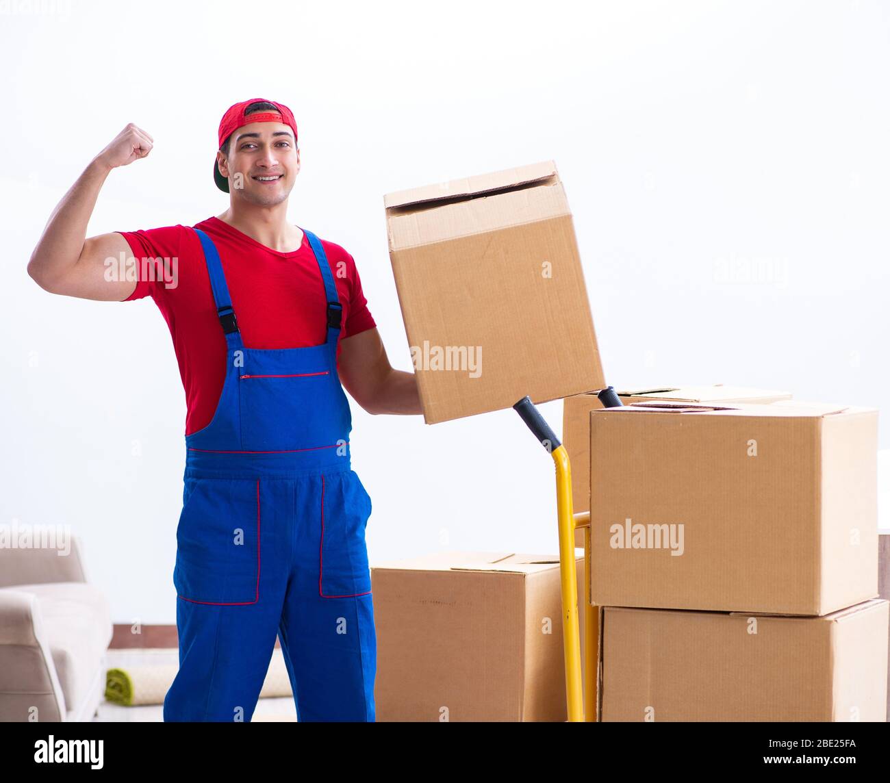 The contractor worker moving boxes during office move Stock Photo