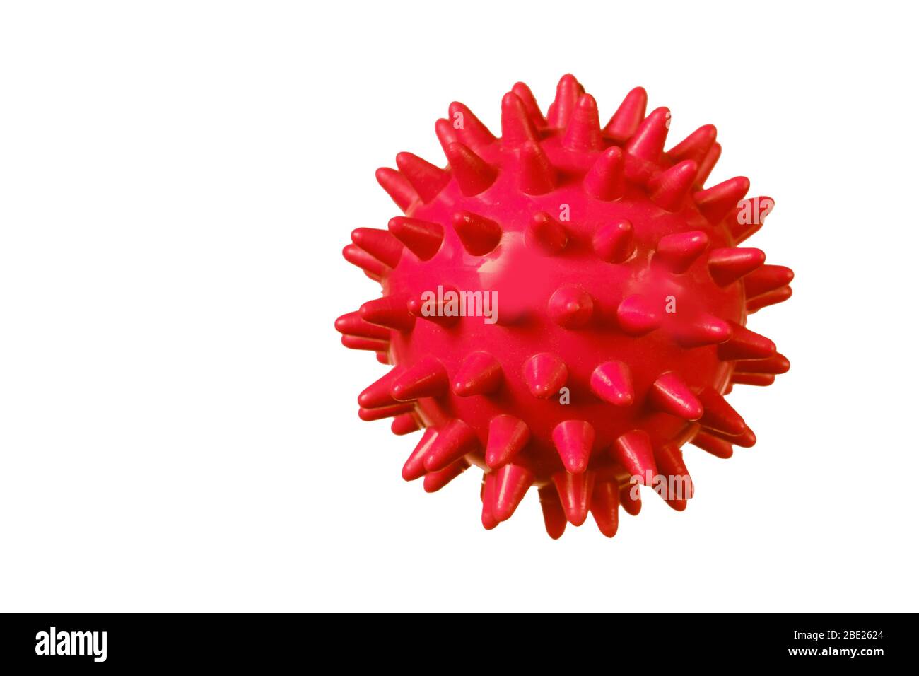 Red rubber ball with spikes on a white background Stock Photo Alamy