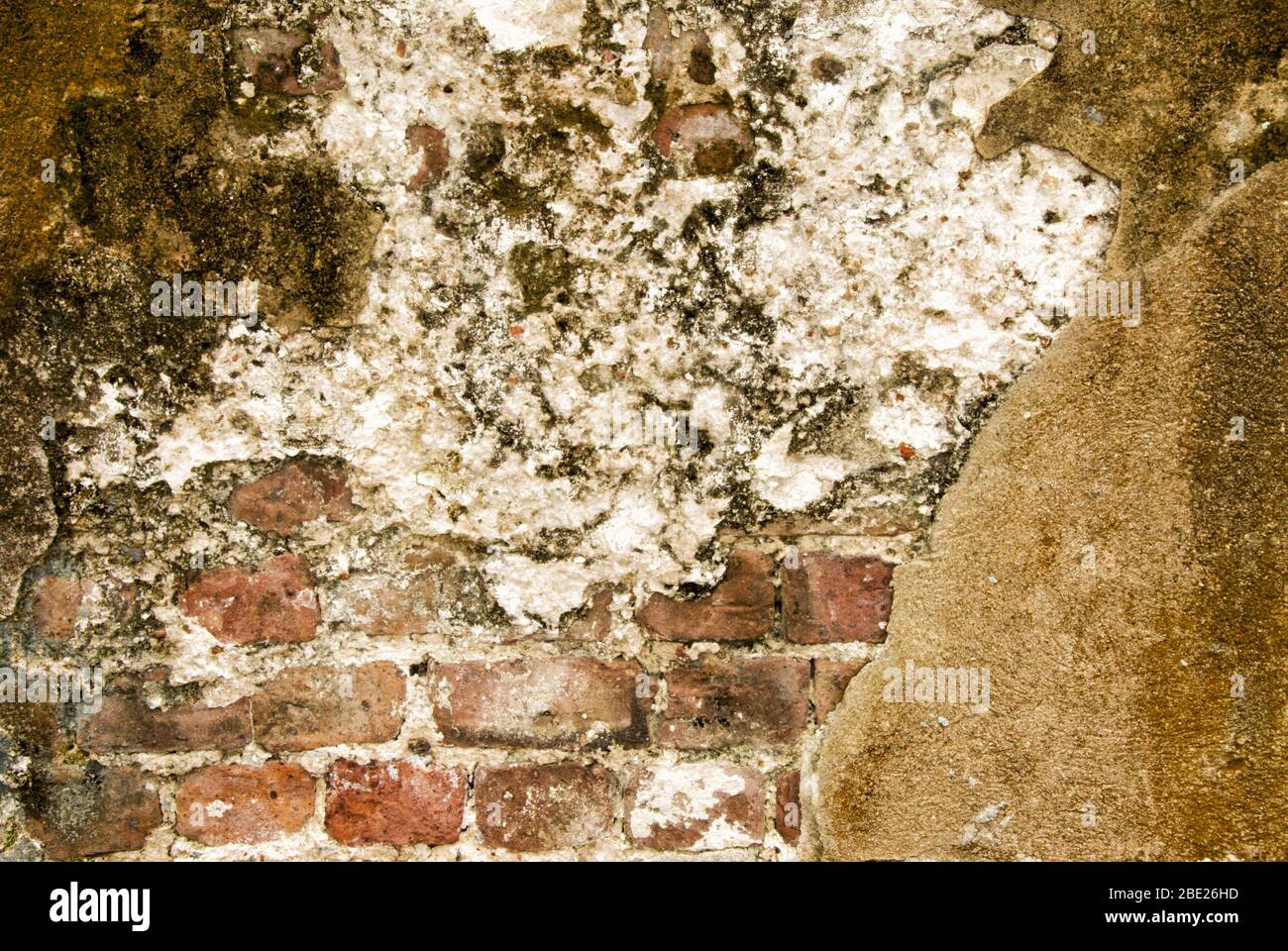 Patched brick wall with concrete hi-res stock photography and images ...