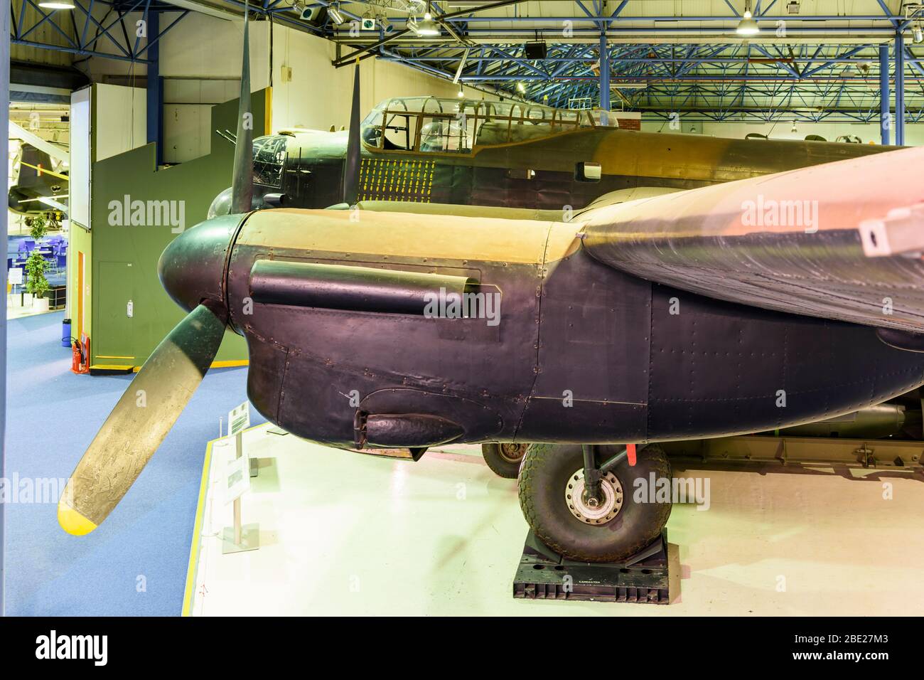 Looking directly across the wings of an Avro Lancaster Bomber aircraft at the RAF Museum Hendon Stock Photo
