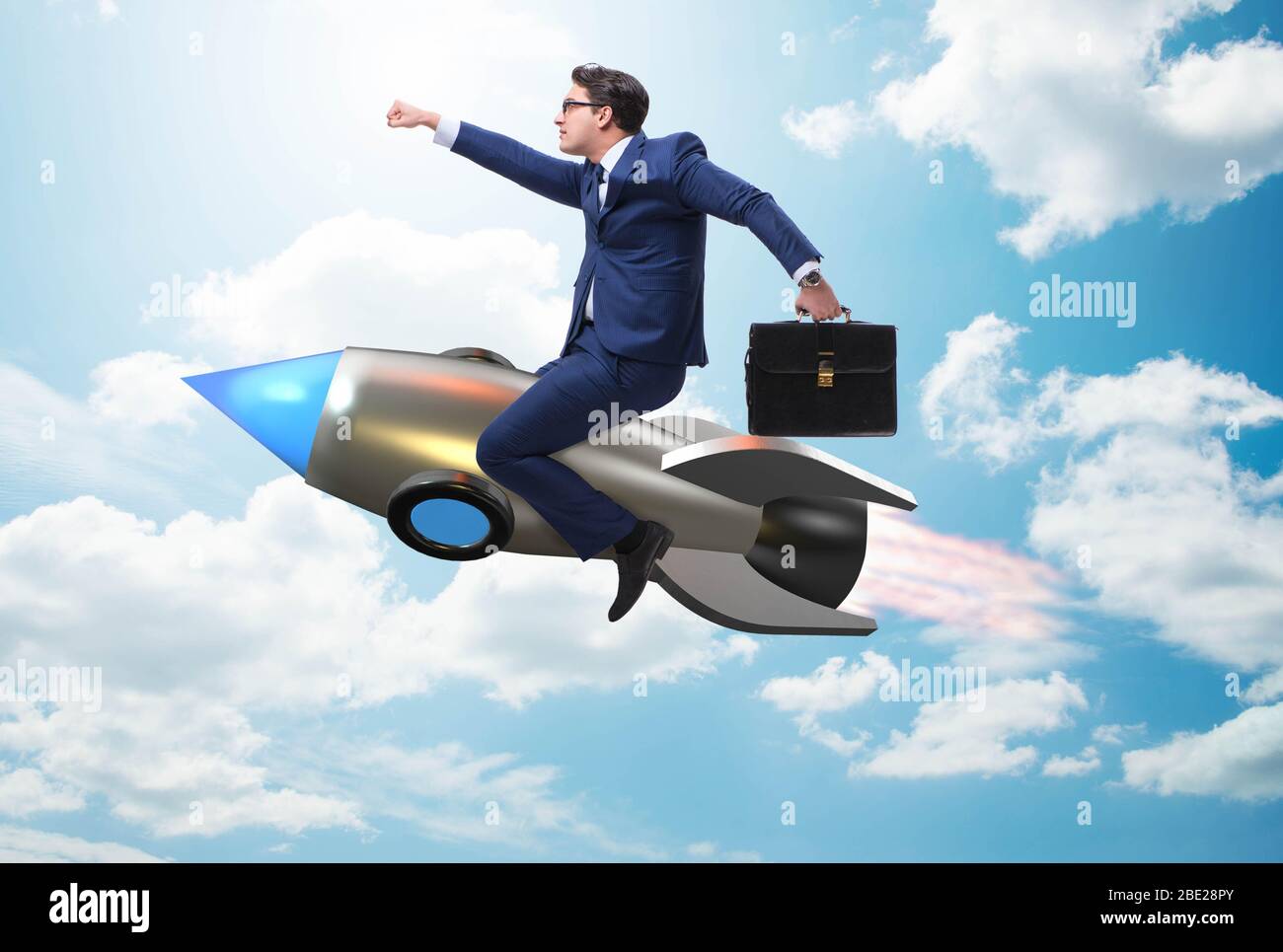 The businessman flying on rocket in business concept Stock Photo - Alamy