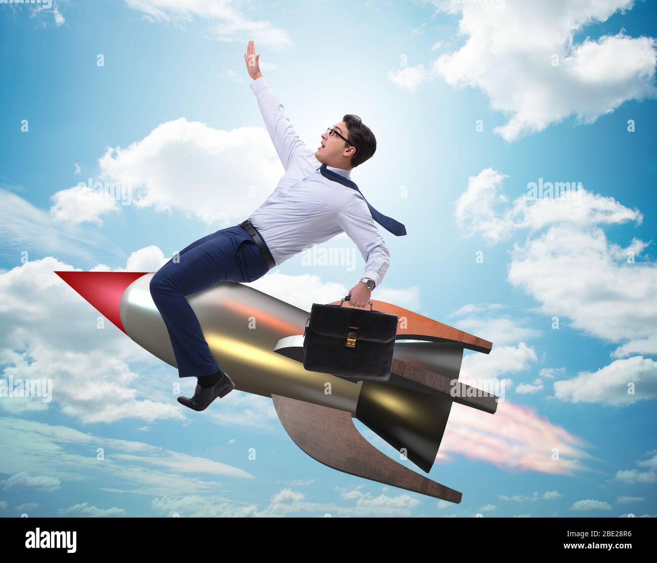 The businessman flying on rocket in business concept Stock Photo - Alamy