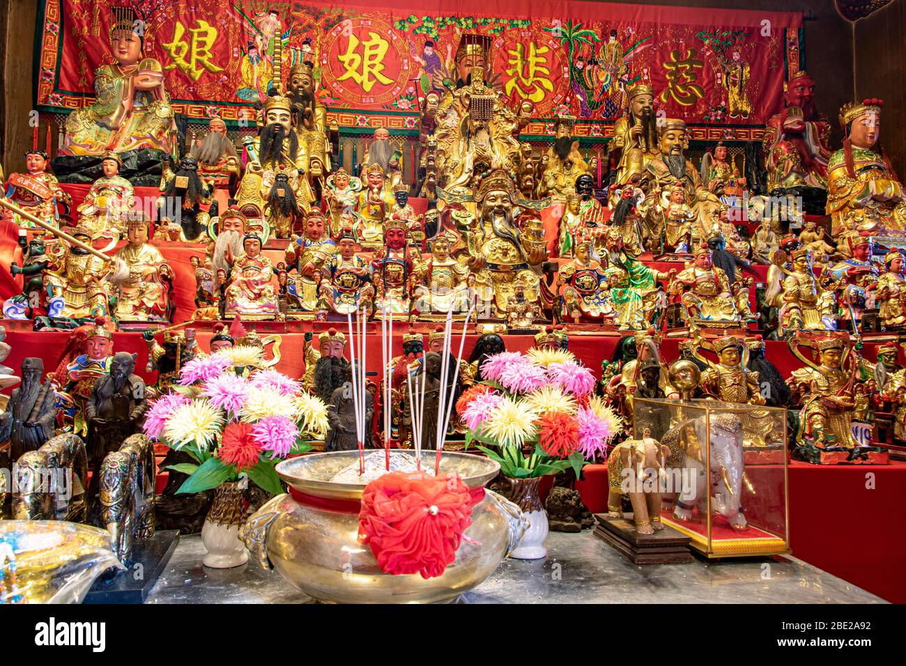 AYUTTHAYA, THAILAND, JAN 27 2020, A many religious figures in Buddhist temple, Wat Phanan Choeng Worawihan. Stock Photo