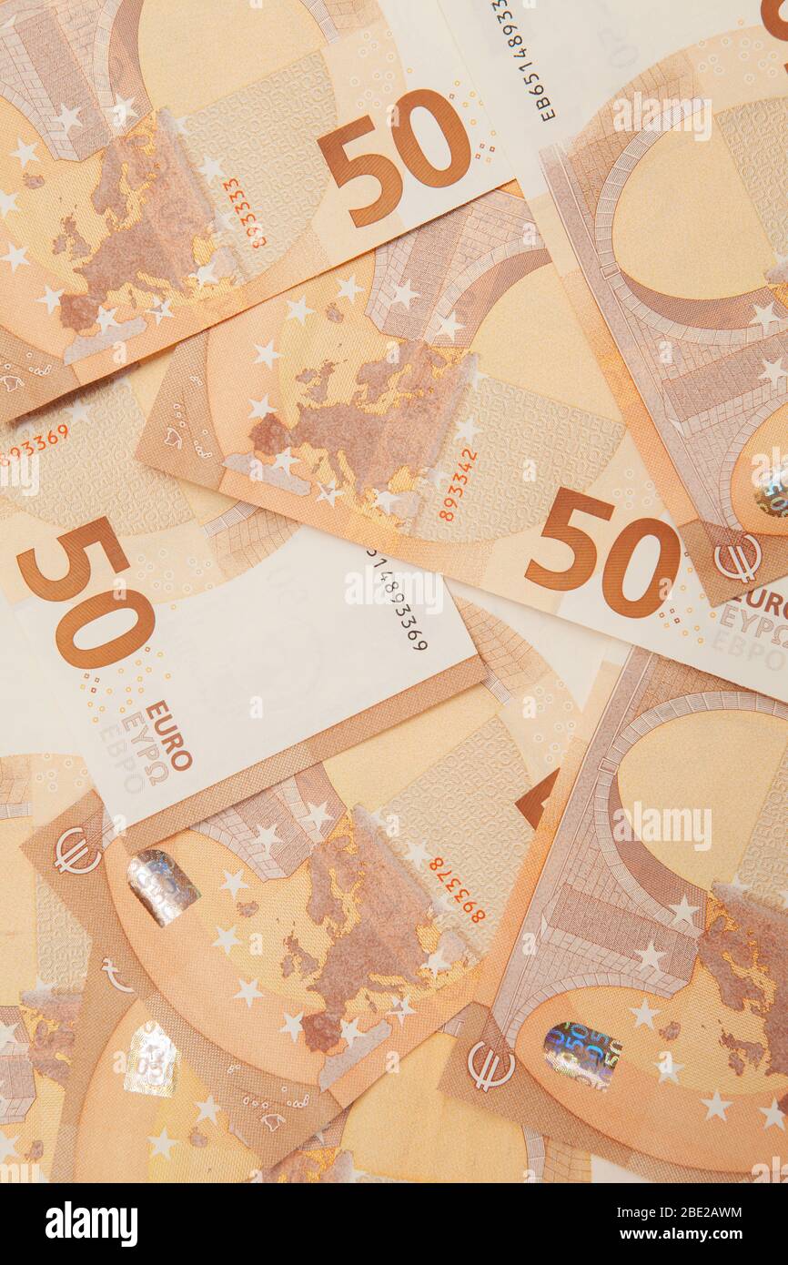 Background from banknotes of 50 euros, top view. Stock Photo