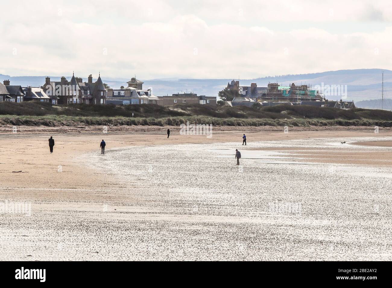 Troon, UK. 11 April 2020. On what would normally be one of the busiest weekends of the year, Easter weekend, it appears that people are taking the Government's advice and staying at home and not travelling to tourist destinations. Troon beach, on Easter weekend would normally be the preferred choice for thousands of tourists and day trippers  who might travel considerable distances to enjoy the resort. Credit: Findlay/ Alamy News Stock Photo