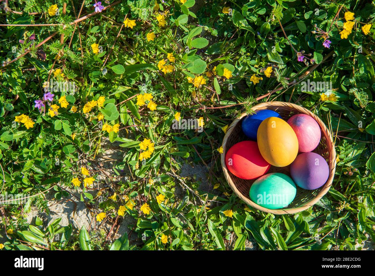 colorful easter eggs in a basket Stock Photo