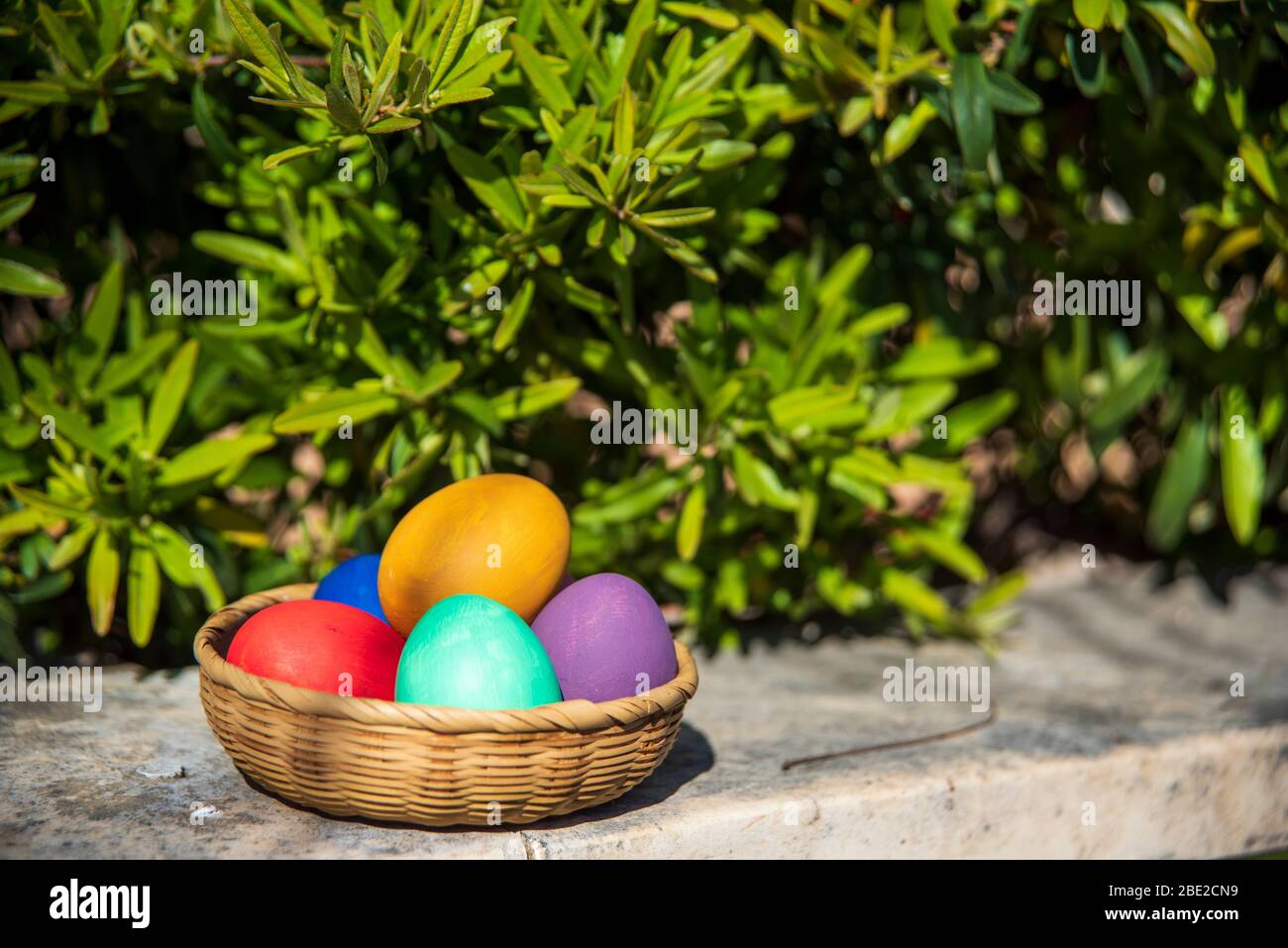 colorful easter eggs in a basket Stock Photo