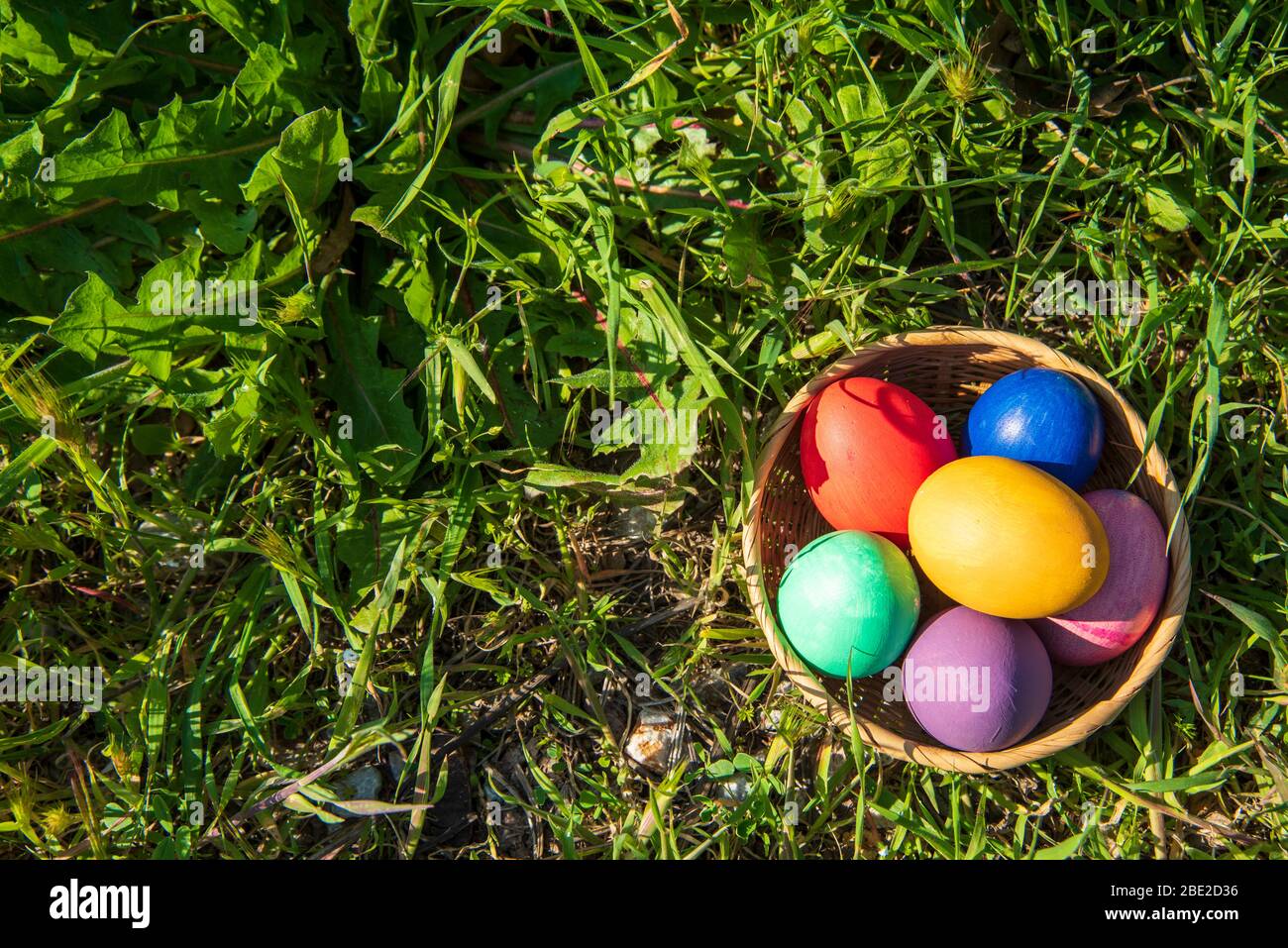 colorful easter eggs in a basket Stock Photo
