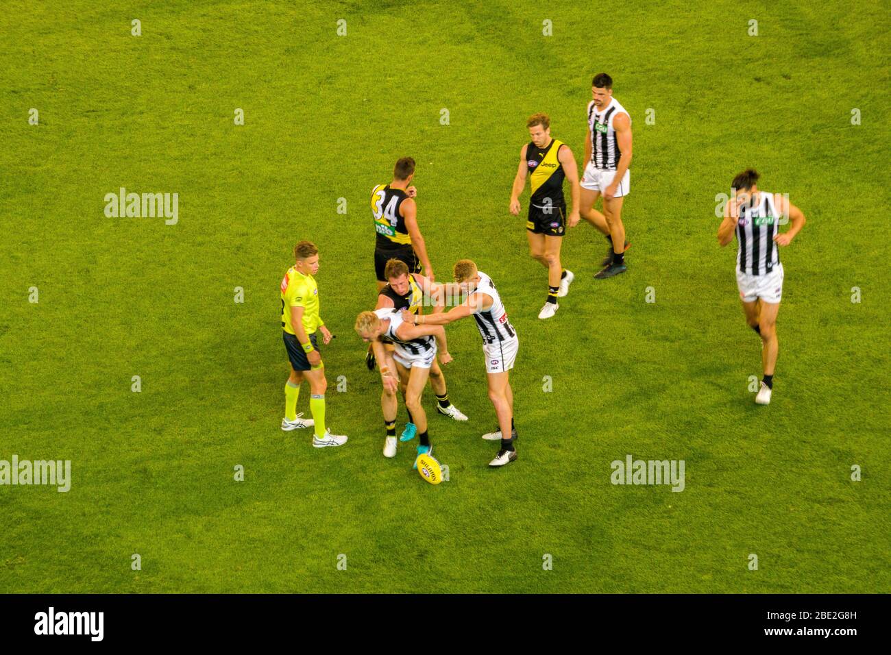 Australian football team playing at Melbourne Cricket Ground Stock