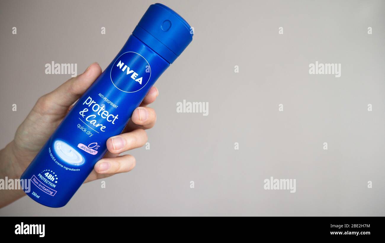 Zrenjanin, Serbia, April 2, 2020 Woman's hand holding can of Nivea