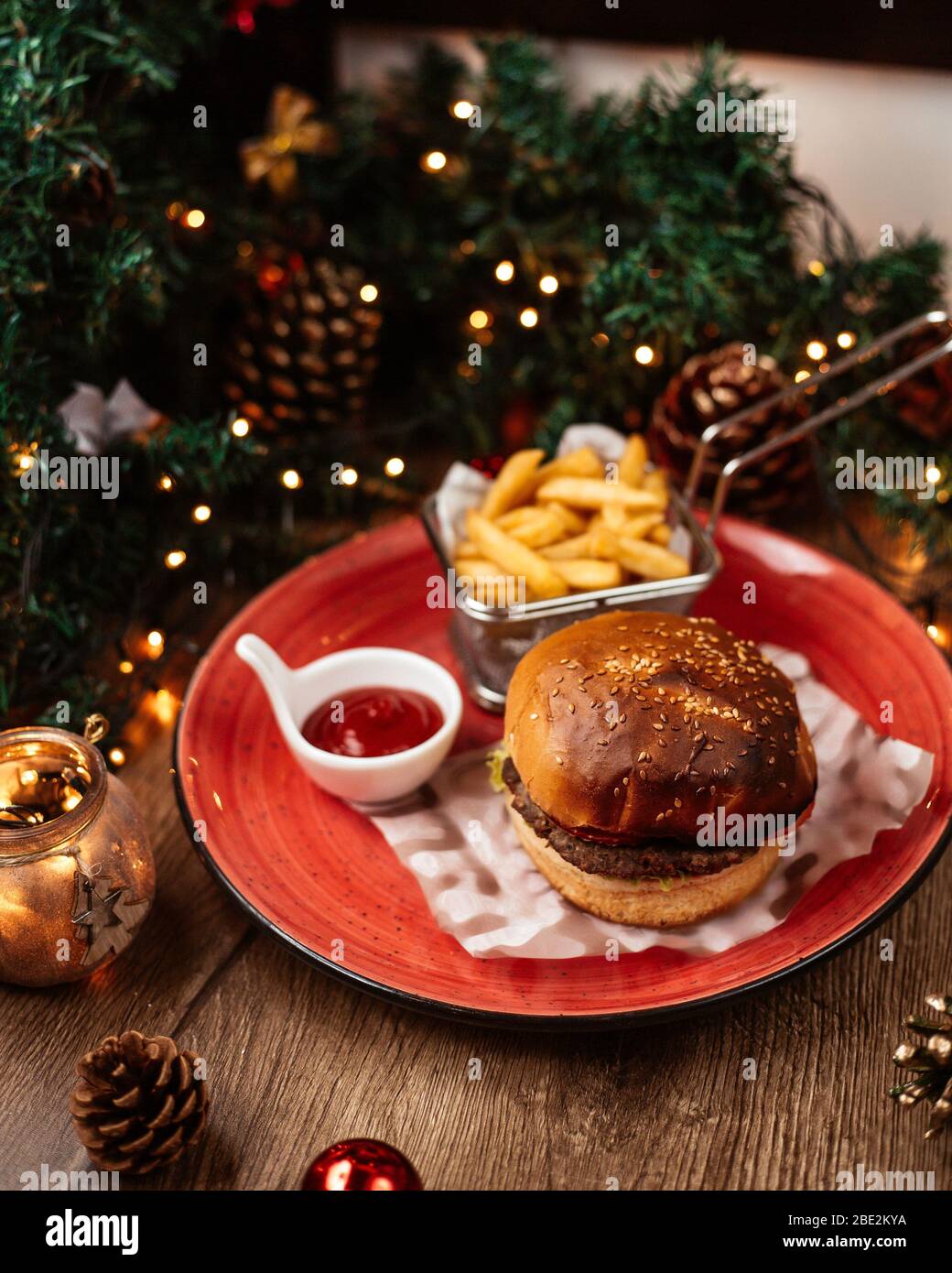 top view of beef burger served with french fries ketchup ear ...