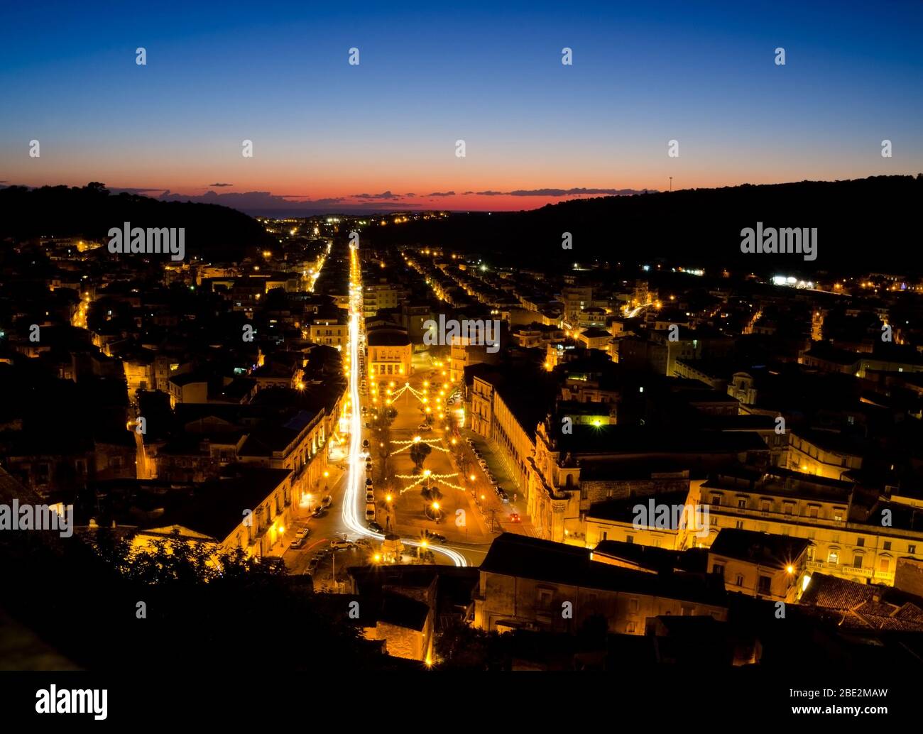 SCICLI, SICILY, ITALY. 31st December 2019. An evening view across the town of Scicli from the Chiesa di San Matteo down Corso Garibaldi towards the se Stock Photo