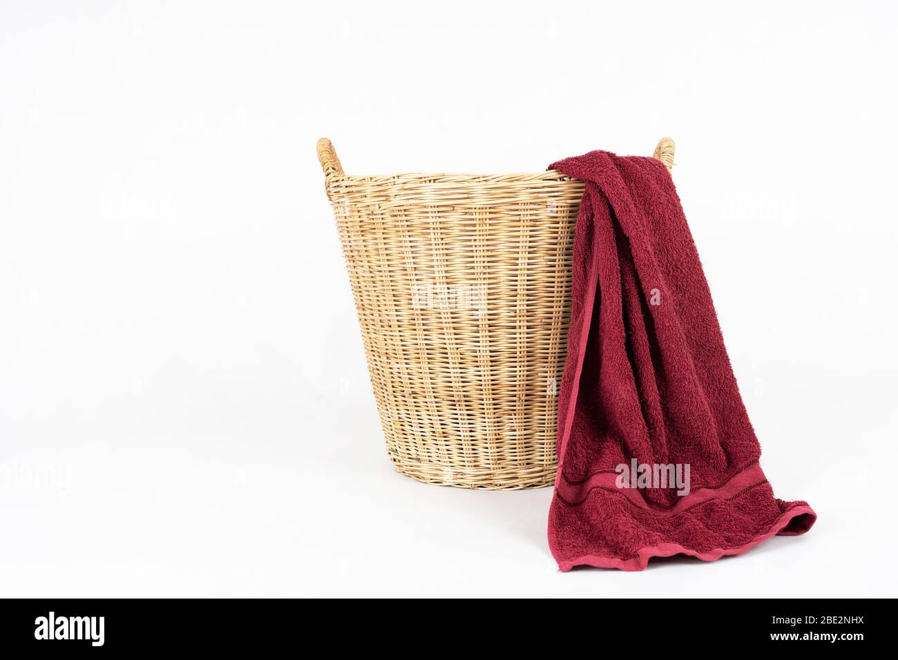 red towel with basket isolated on white background Stock Photo