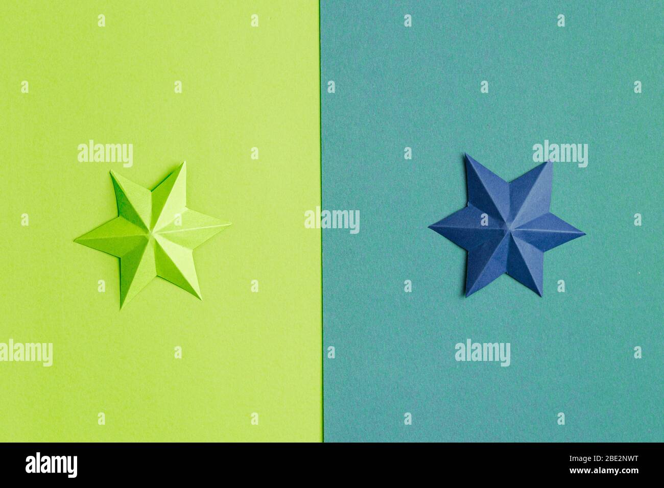 Colored paper stars over different background Stock Photo