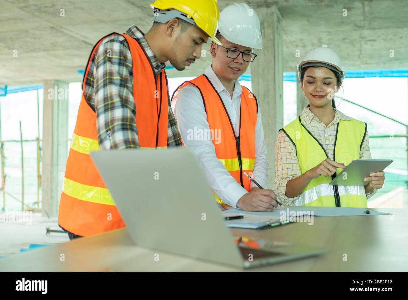 Plan on table with male hand pointing hires stock photography and