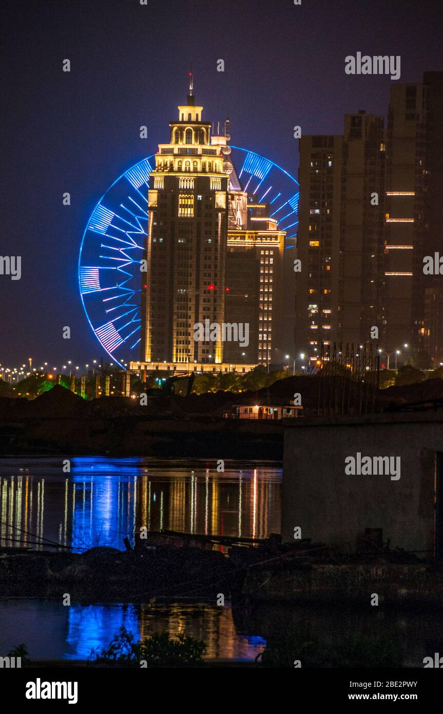 Night view on Nanchang city showing the Star of Nanchang formerly the world's largest Ferris wheel, Jiangxi Province, China Stock Photo