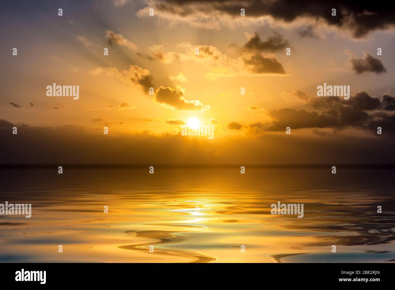 Ein Sonnenuntergang über dem Ozean Stock Photo