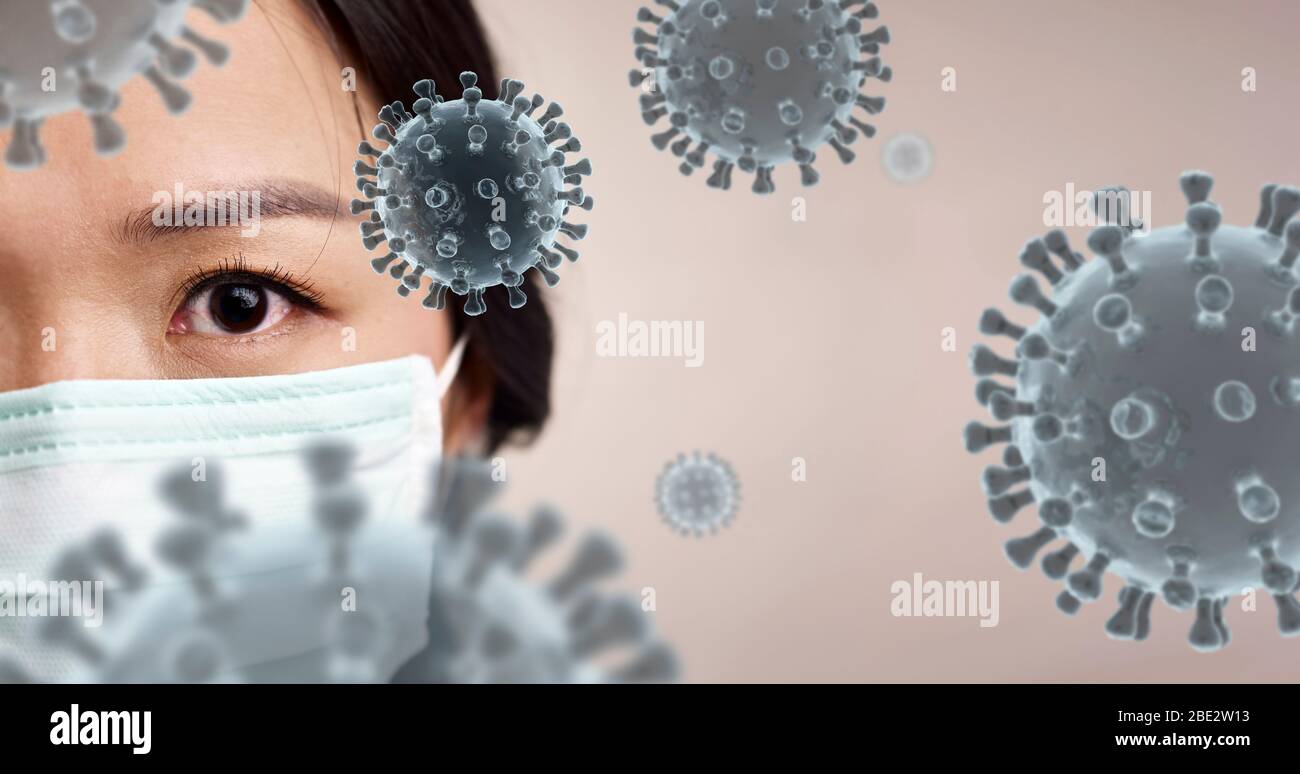 young asian woman wearing face mask showing fear for covid-19 coronavirus Stock Photo