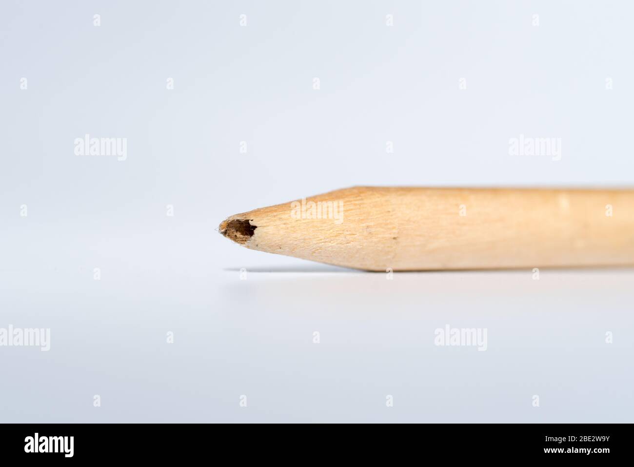 Broken Pencil tip macro view on white background Stock Photo