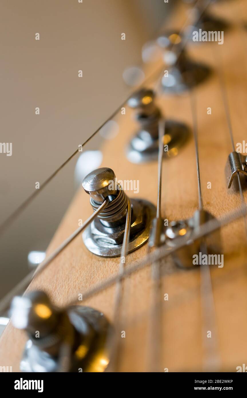Splitting electric guitar close-up. Soft focus, shallow depth of field Stock Photo