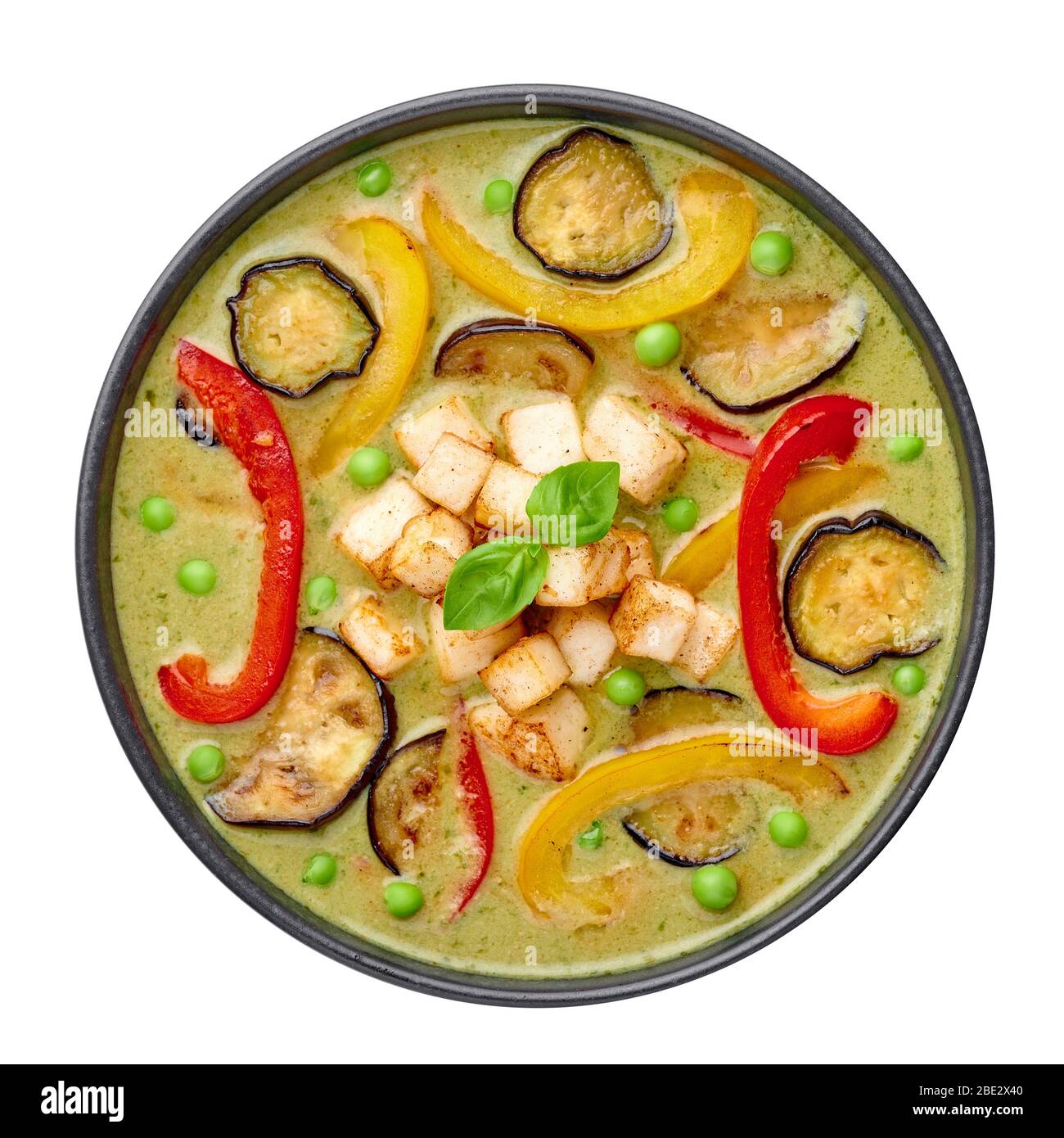 Vegetarian Thai Green Curry with tofu in black bowl isolated on white ...