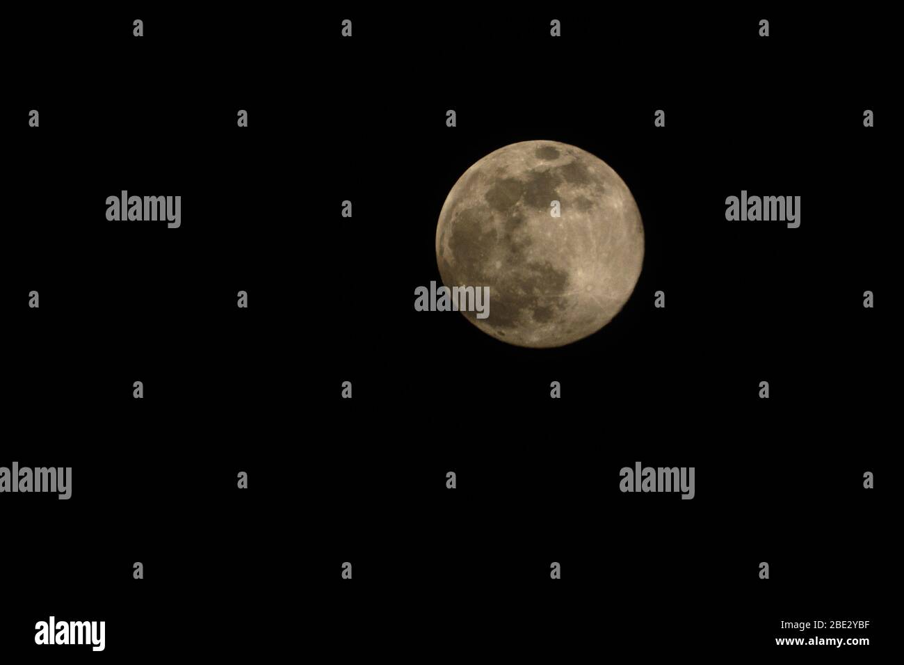 Close-up of a full moon to the right side of the image (landscape orientation) Stock Photo