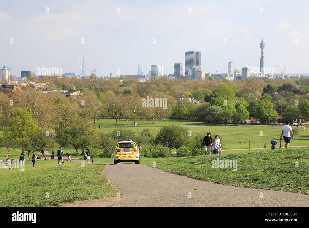 London, UK. 11th Apr, 2020. Police persuading people to keep on the move on Primrose Hill, on a hot and sunny Easter Saturday, in the middle of the coronavirus pandemic lockdown. Credit: Monica Wells/Alamy Live News Stock Photo