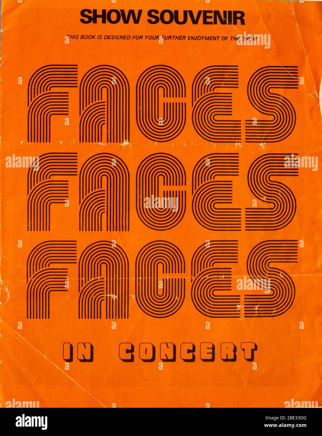 Rod Stewart and the Faces In Concert tour show souvenir program from the 1974 UK tour. Bright orange cover. Stock Photo