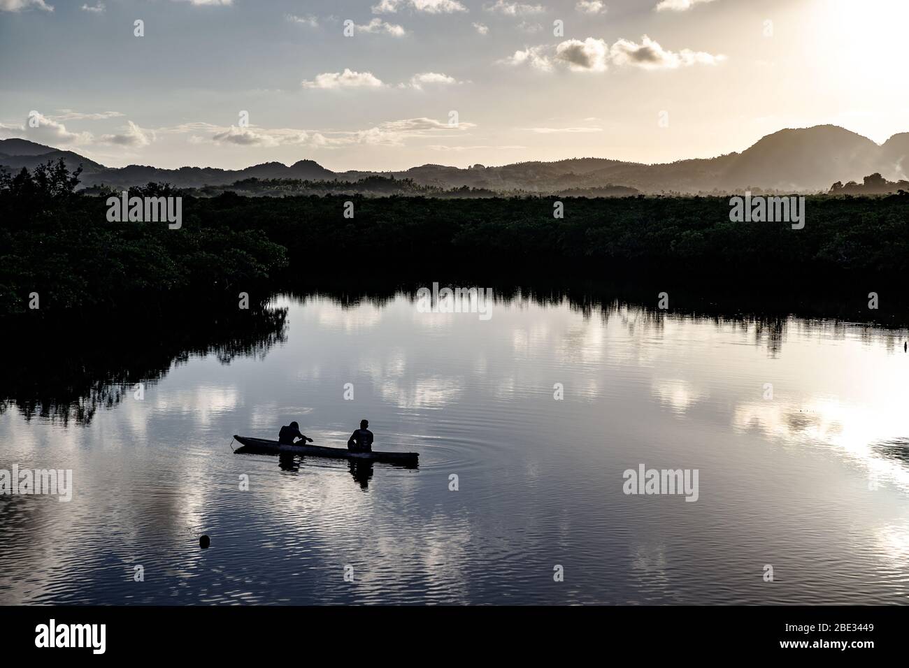 Two men enjoying the landcape when fishing Stock Photo