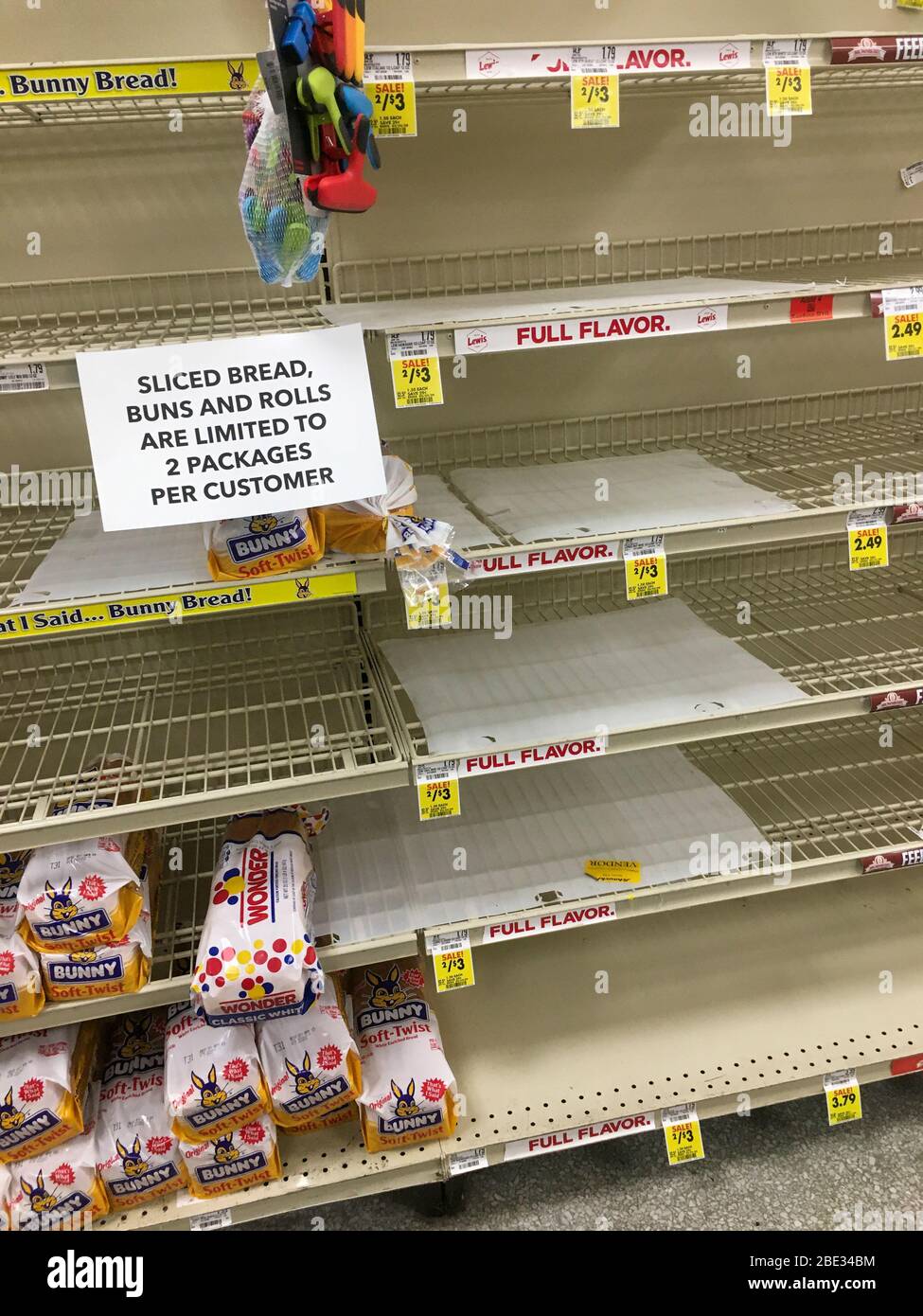 St. Charles, Missouri 3-22-2020 USA, Almost empty shelves of bread at a local grocery store in response to coronavirus pandemic. Stock Photo