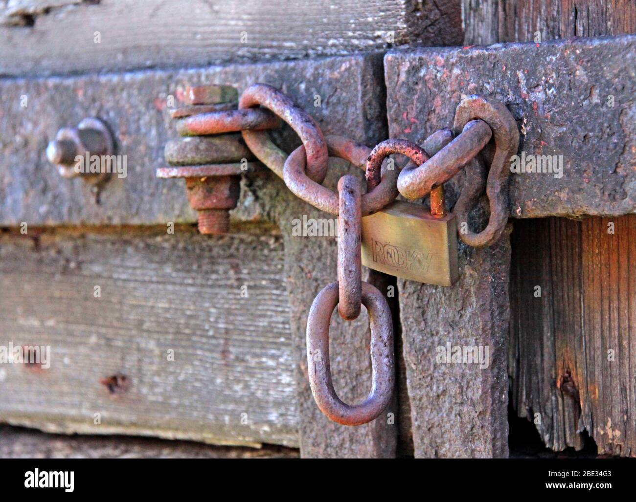 Padlock and old chain at Lion Salt Works Marston, Northwich, Cheshire, England, UK Stock Photo