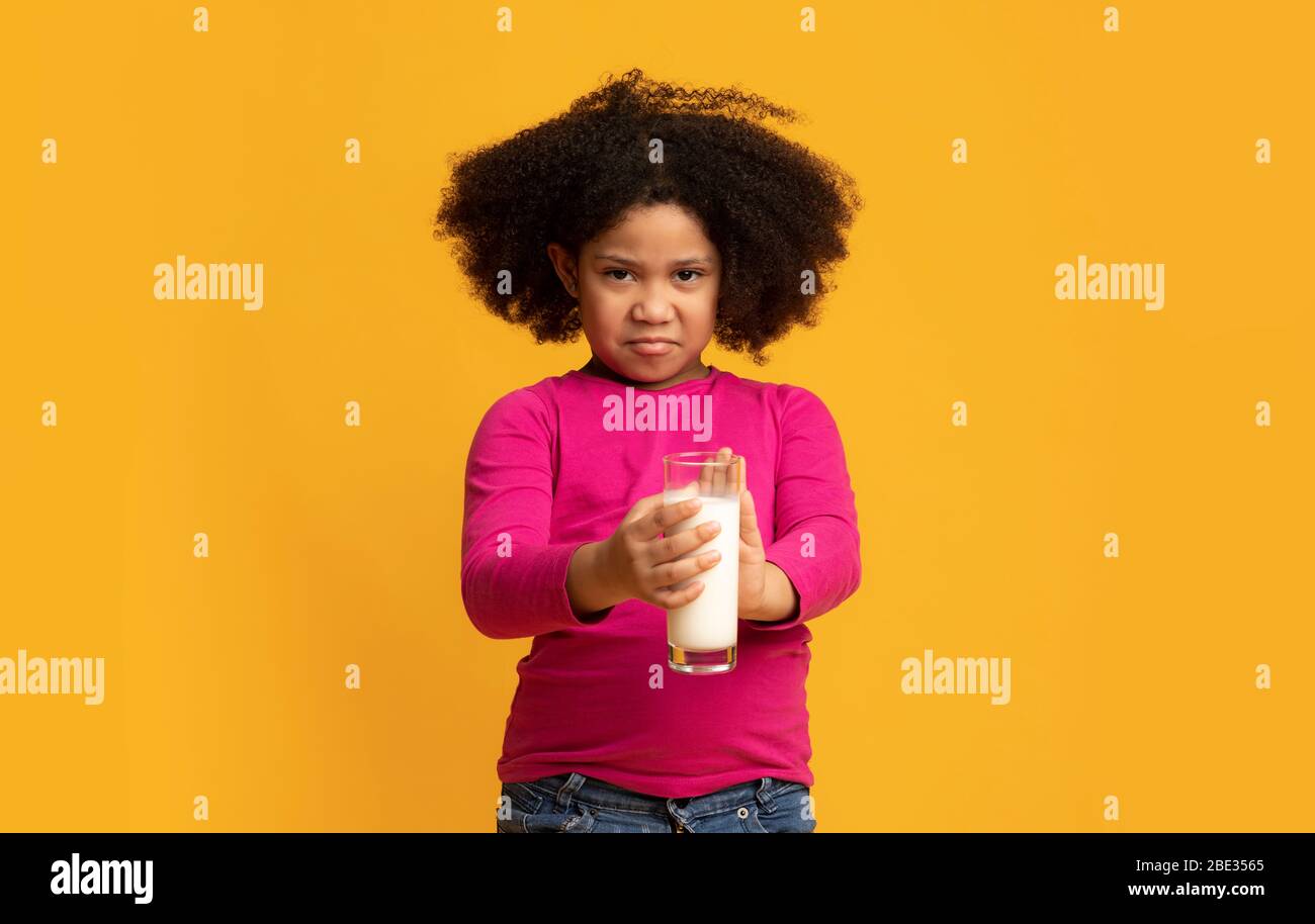 Lactose Intolerance. Stubborn Little Black Girl Rejecting To Drink Milk