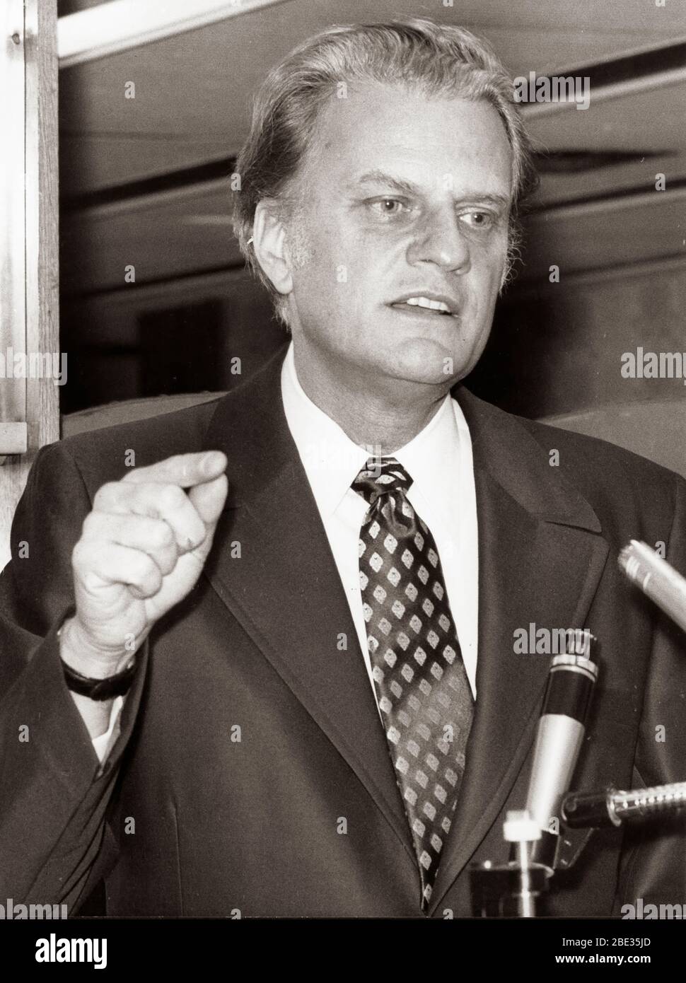 Oct. 2, 1960 - London, England, U.K. - BILLY GRAHAM, born William Franklin Graham, Jr. on November 7, 1918, is an evangelical Christian reverend.  He gained celebrity status by broadcasting his sermons on radio and television. PICTURED: Reverend Billy Graham speaking during on of his sermons. Stock Photo