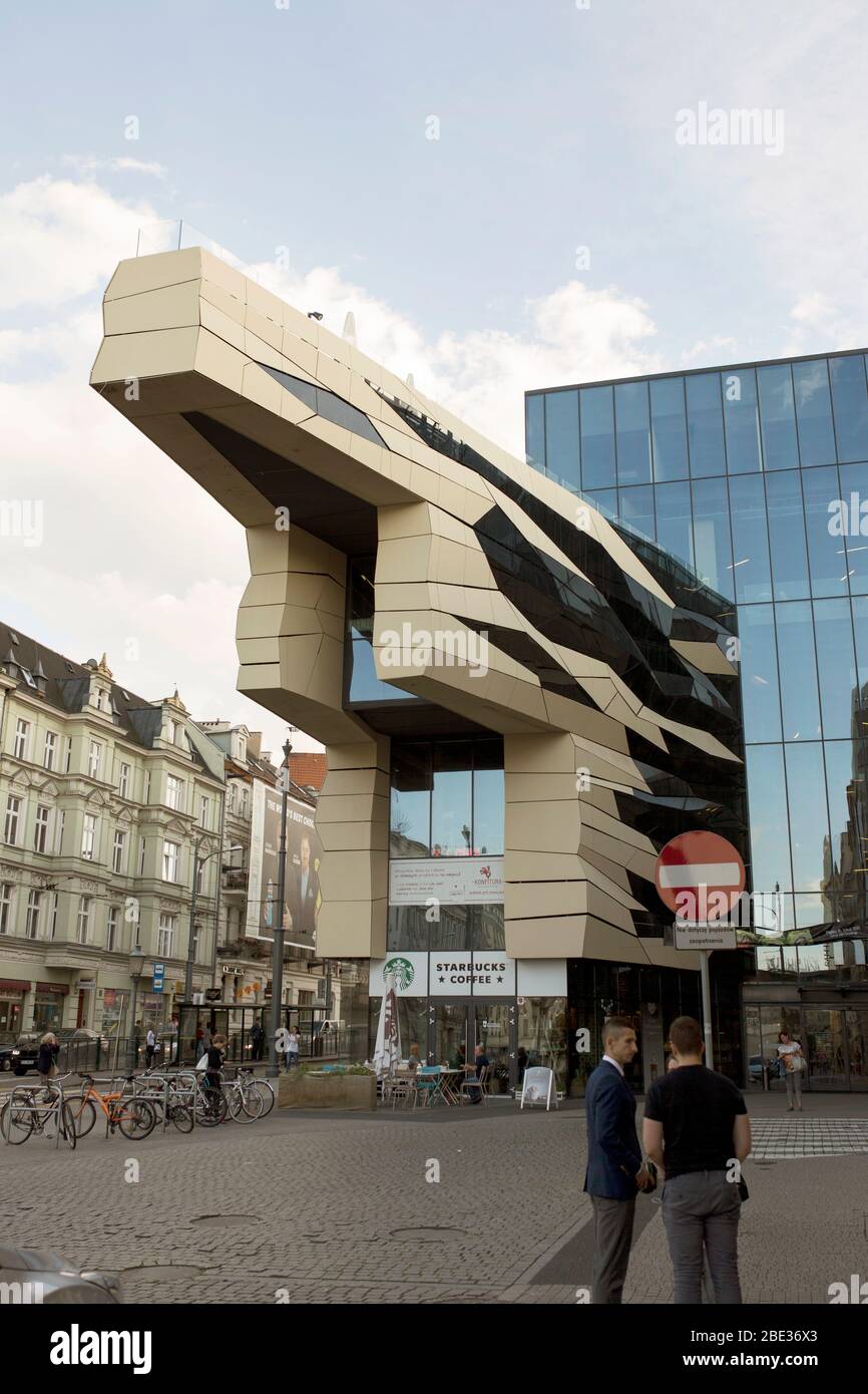 The entrance to the Galeria MM shopping mall in Poznan, Poland, with a  rooftop overlook and a Starbucks Stock Photo - Alamy