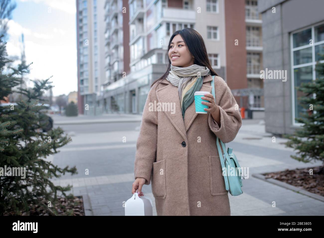 Beige and blue coat hi-res stock photography and images - Alamy