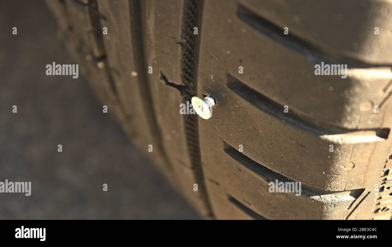 Metal Screw In Vehicle Tire Closeup Stock Photo Alamy