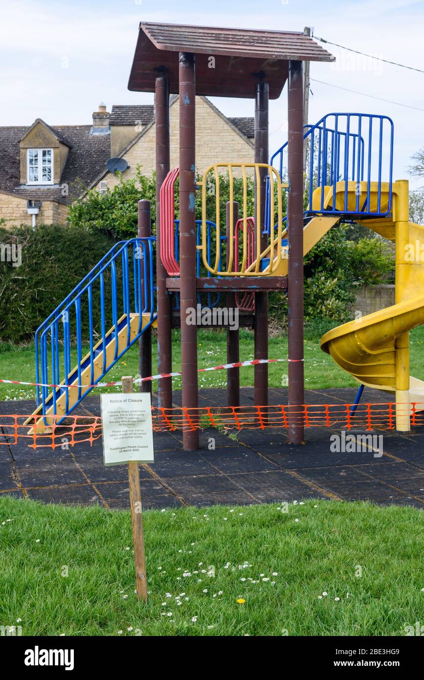 The playground in the village of Ducklington Oxfordshire is closed during the Coronavirus pandemic. Stock Photo