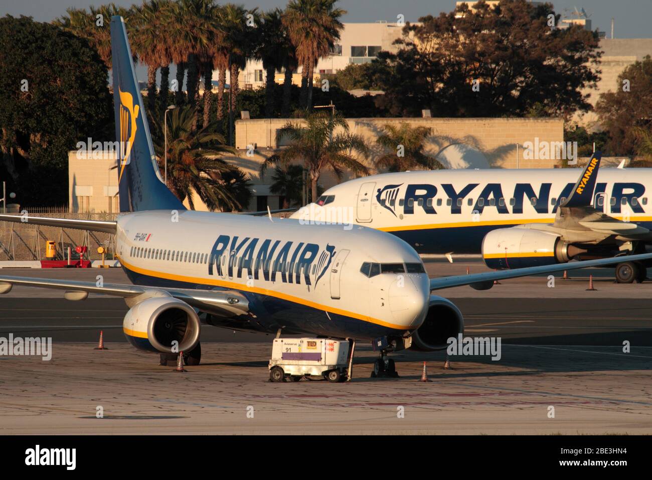 Boeing 737-800 passenger jet airplanes belonging to low cost airline Ryanair grounded in Malta airport. Impact of COVID-19 pandemic on air travel. Stock Photo
