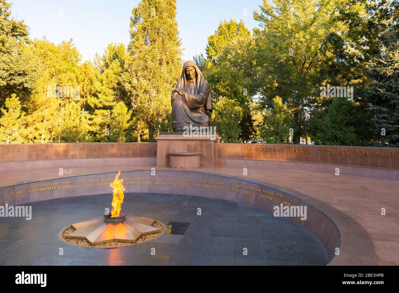 Eternal Flame monument in Mustaqillik Maydoni Square in Tashkent, Uzbekistan. Tomb of the Unknown Soldier in Square of memory and Honor. Eternal fire. Stock Photo