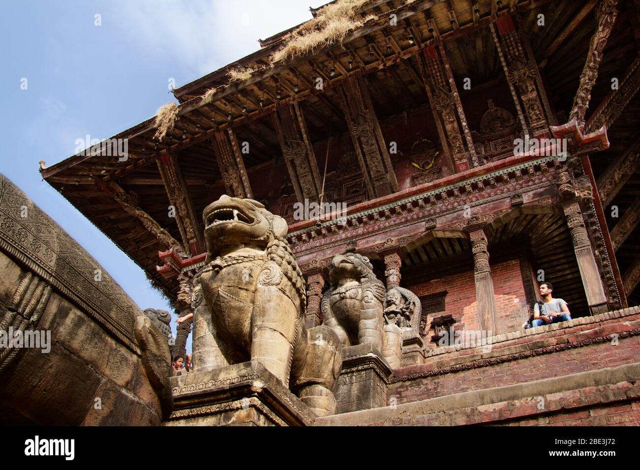 Nepal, Kathmandu, Bhaktapur, Nyatapola, Temple, Hinduism, Street, People, Tourist, Village, Detail. Statue, Rest, Relax Stock Photo