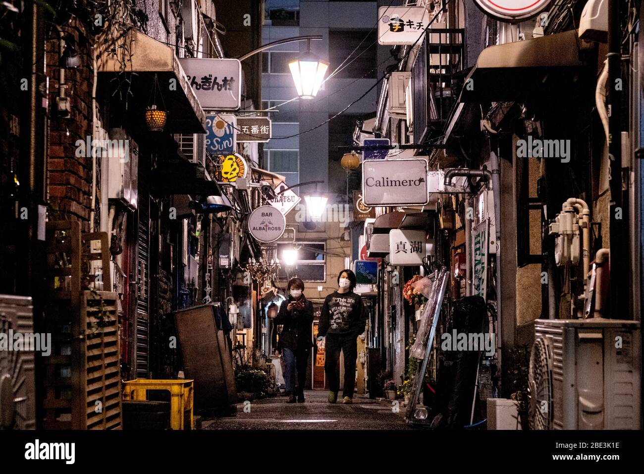 A Couple Walk Through Golden Gai Famous Nightlife Area In Shinjuku The Japan Government Declared A State Of Emergency To Cover Tokyo Osaka Saitama Kanagawa Chiba Hyogo And Fukuoka Prefectures From The 7th