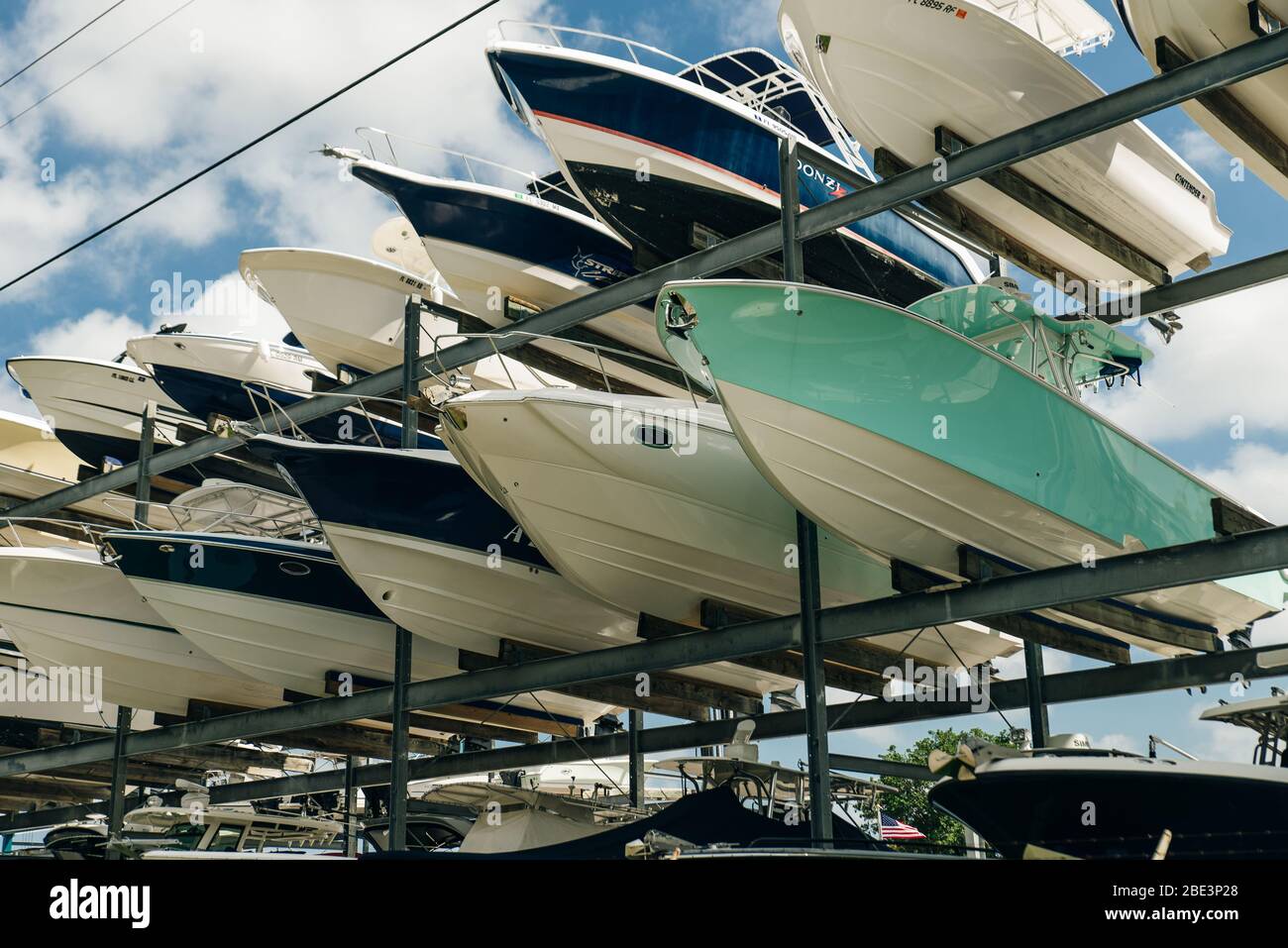 speed motor boats are stapled in a garage system in the prestigious ...