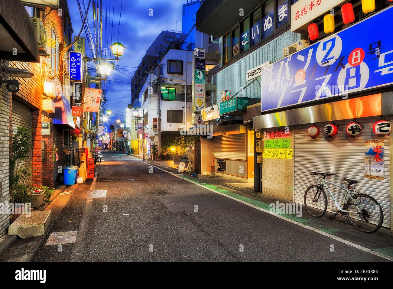 Tokyo, Japan - 2 Jan 2020: Local shopping street in Shimo-Kitazawa district of Tokyo in erarly morning before crowds with closed shops. Stock Photo