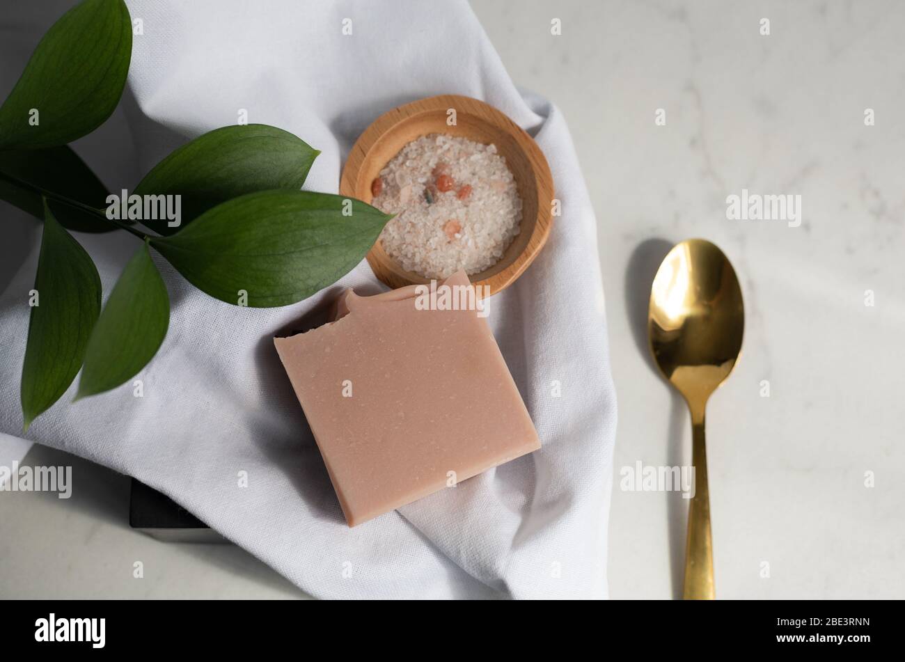 clean bath gold spoon flatlay Stock Photo Alamy