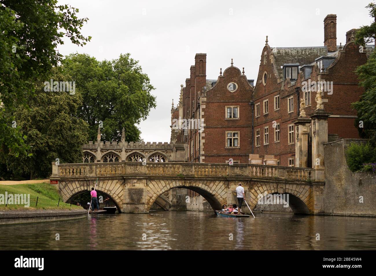 Punting on the Cam River by the Kitchen Bridge and the Bridge of Sighs at St John's College in Cambridge, England, United Kingdom. Stock Photo