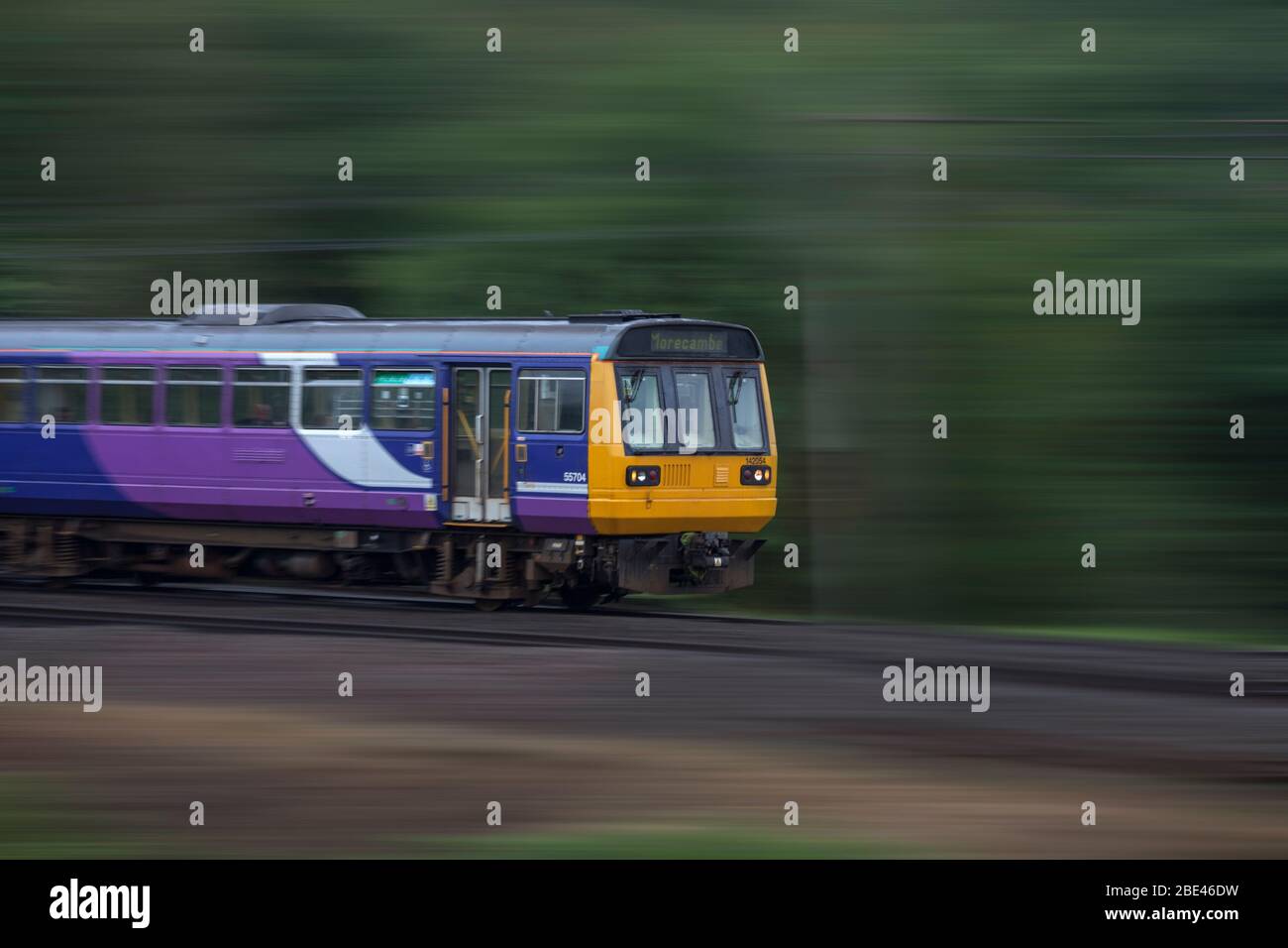 Northern Rail / Northern Trains  class 142 pacer train panned at speed on the west coast mainline Stock Photo
