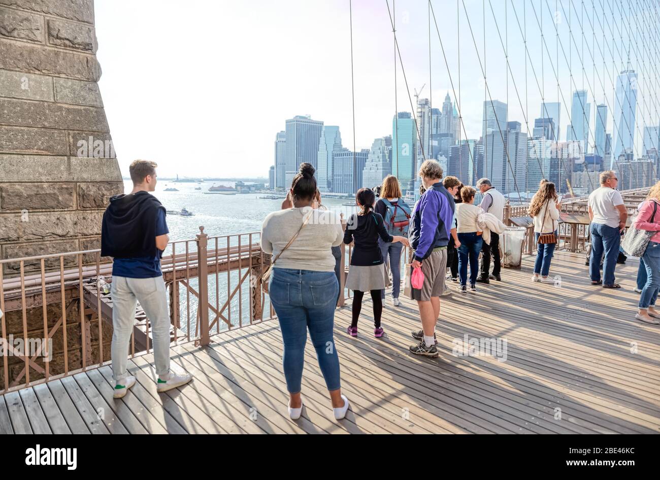 People on the lookout at Brooklyn Bridge in New York Stock Photo Alamy
