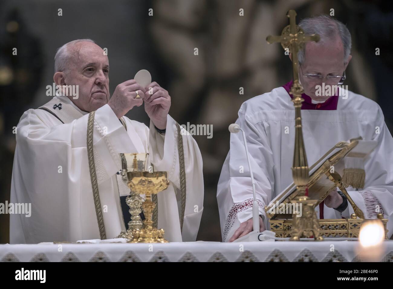Vatican, Vatican City. 11th Apr, 2020. Pope Francis presides over Easter's Holy Saturday Vigil held behind closed doors at St. Peter's Basilica in the Vatican on Saturday, April 11, 2020, during the lockdown aimed at curbing the spread of the COVID-19 infection. Pool Photos by Possolo/Spaziani/UPI Credit: UPI/Alamy Live News Stock Photo