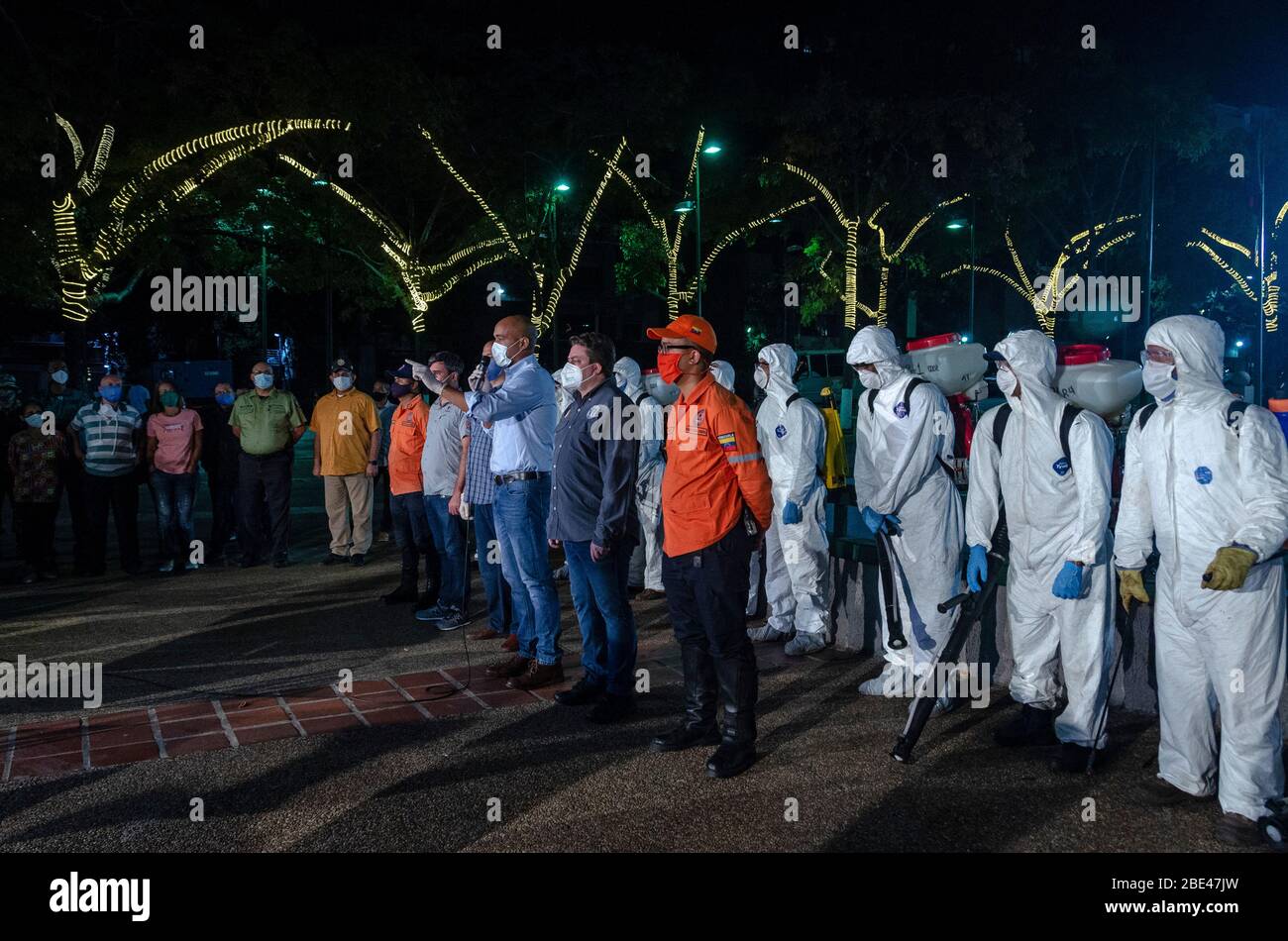 Miranda State Governor Hector Rodriguez explains the next day to be held. Day of night cleaning and disinfection in the streets of Caracas, Venezuela, Stock Photo