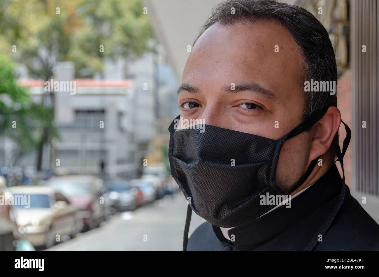 A priest from a community in Caracas during an atypical Holy Week due to the Covid-19 virus quarantine Stock Photo
